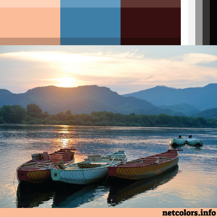 The Pantone Color of the Year 2024: Peach Fuzz color palette inspiration photo: three boats afloat at sunset with mountains in the background
